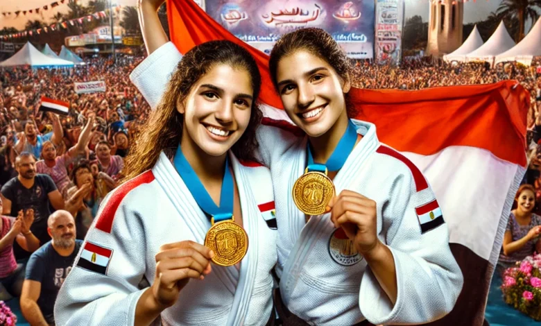 Dall·e 2024 08 25 17.00.56 A Dynamic Scene At Alamein Festival Featuring The Egyptian Twin Sisters Farida And Fayrouz Celebrating Their Gold Medal Victory In The Arab Judo Champ